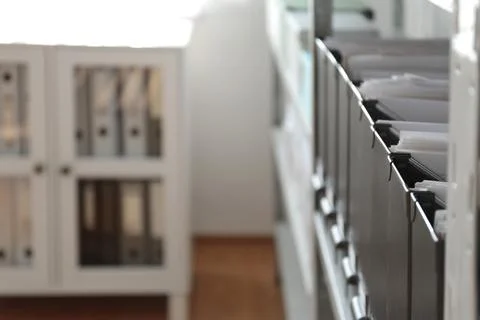 Folders with documents on shelf in archive. Space for text Stockfoto's