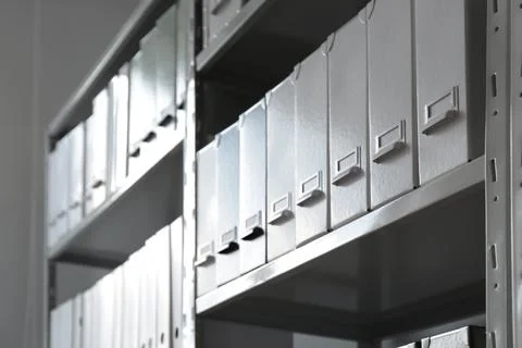 Folders with documents on shelves in archive Stockfoto's