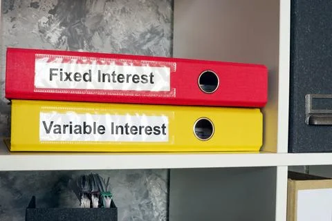 Folders labeled fixed and variable interest. Loan management. Stock-Fotos