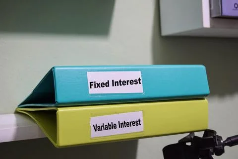 Folders labeled fixed and variable interest, loan management concept 스톡 사진