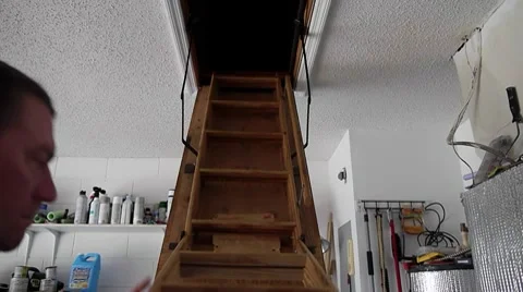 Folding attic ladder Stock Footage 10773098