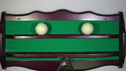 Folding billiard balls on the shelf. Playing Russian billiards Stock Footage 147224533