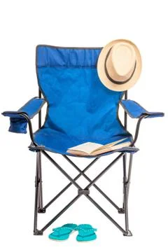 Folding chair and objects for a summer vacation in nature isolated Stock Photos