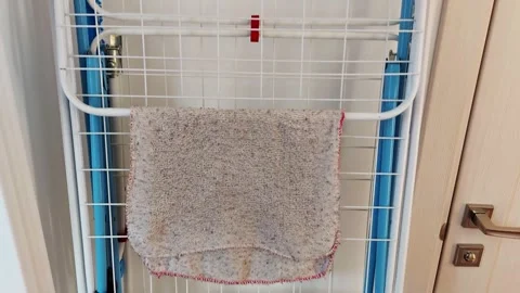 Folding Drying Rack with Towels in Home Bathroom Video stock 310656535