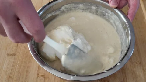 Folding Egg Whites into Waffle Batter 스톡 동영상 347907933