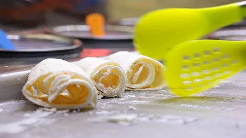 Folding the finished product with an instrument. Stock Footage 89466987