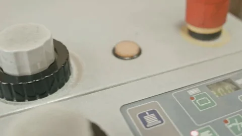 Folding machine on printing polygraph industry - red button and conveyer, close Stock Footage 69126729
