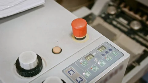 Folding machine on printing polygraph industry - red button and conveyer Stock Footage 74203686