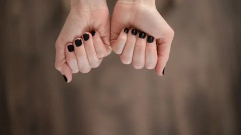 Folding palms hold pills and coins. Video stock 106331337