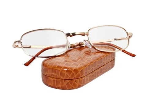 Folding reading glasses with case on a white background Stock Photos