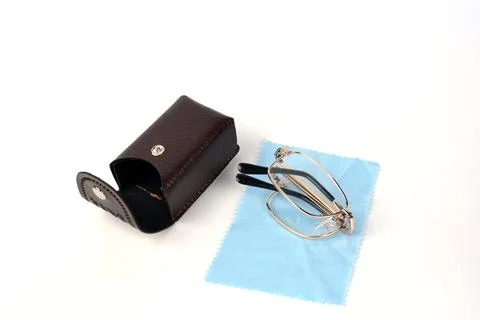 Folding reading glasses with hard case. Stock Photos