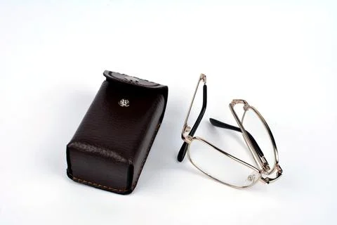Folding reading glasses with hard case. Stock Photos
