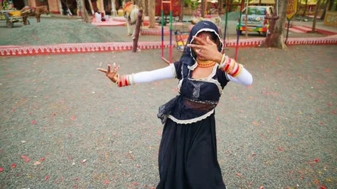 Folk artist perform native act at village by cultural event Stock Footage 312729568
