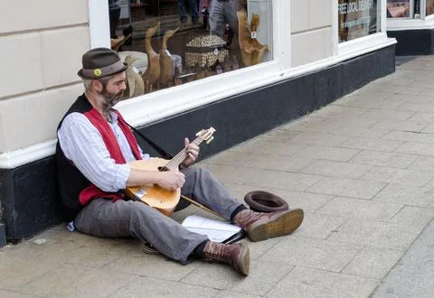 Folk busker Stock Photos