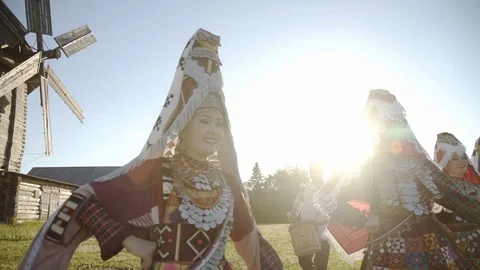 Folklore ensemble indigenous people dancing in traditional clothing outdoor on 스톡 동영상 129866028