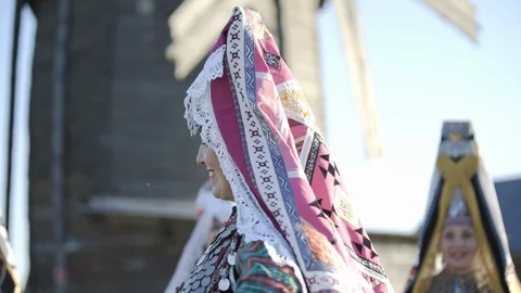 Folklore ensemble indigenous people dancing in traditional clothing outdoor on Stock Footage 129866575