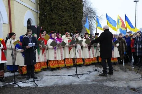 Folklore ensemble, musicians dressed in native Ukrainian costumes playing m.. Stock Photos