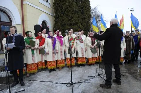 Folklore ensemble, musicians dressed in native Ukrainian costumes playing mus Stock Photos