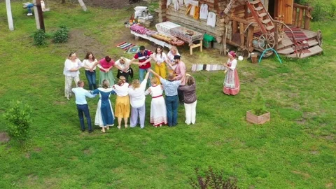 Folklore ensemble of a round Slavic dance on the embankment Stock Footage 267958608