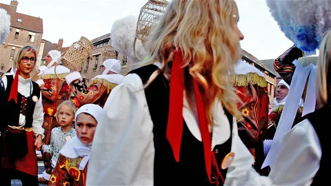 Folkloric giants procession at Mouscron carnival : the Gilles Stock Footage 90379628