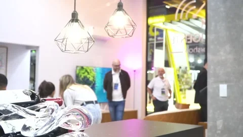 Folks at Electronics Exhibition stall represented classically Video stock 248691890