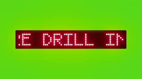 FOLLOW FIRE DRILL INSTRUCTIONS Scrolling Red Dot Matrix LED Text Animation on Stock Footage 317365290
