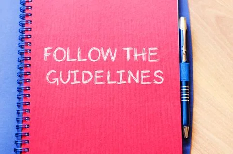 Follow the guidelines write on notebook Stock Photos
