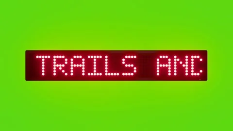 FOLLOW MARKED TRAILS AND AVOID SHORTCUTS Scrolling Red Dot Matrix LED Text Stock Footage 317365272