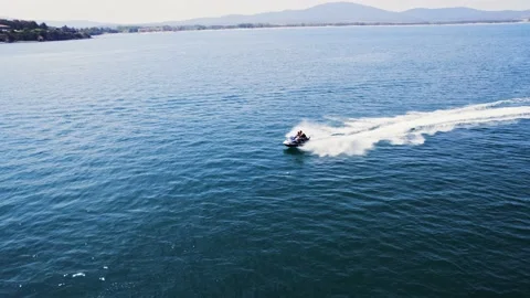 Follow Parallel Jetski Riders Fast Luxury Coast Sea Left to Right Transition Video stock 235663079