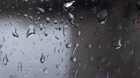 Follow raindrop as it slides down glass window. Close up Stock Footage 118273757