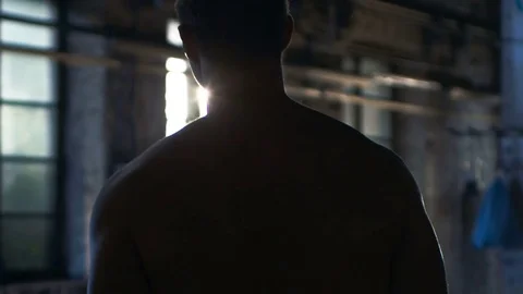 Follow-up Shot of Muscular Shirtless Man Entering Gym in Slow Motion.  Stock Footage