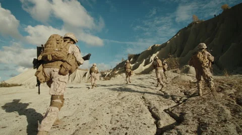 Follow Shot of Squad of Soldiers Running... | Stock Video | Pond5