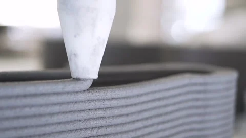Follow through shot Extra Close up Cement Printing Machine is printing high Stock-Footage 243976111