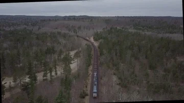 Follow train in rural area 動画素材 85558388