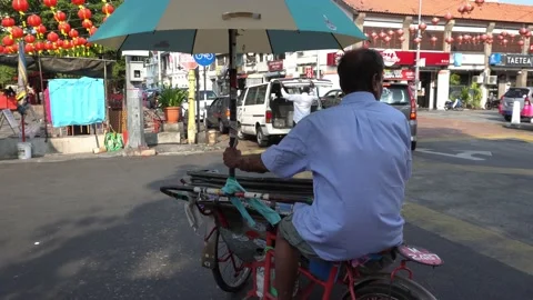 Follow trishaw driver reverse direction Stock Footage 130834761