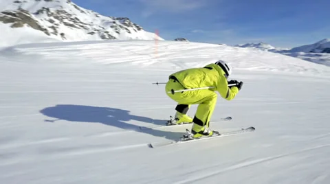 Following alpine skier Stock Footage 33215533