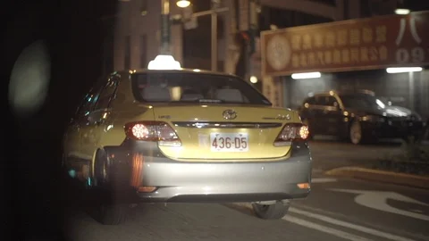Following a cab at night Stock Footage 85812530