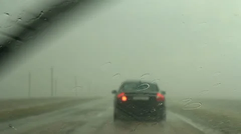 Following Car In Rain Stock-Footage 22337335