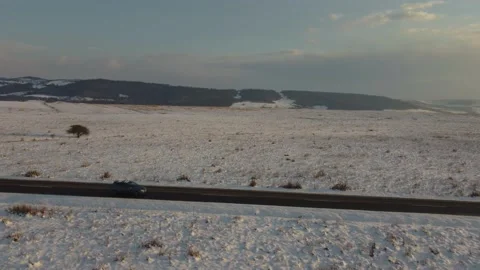 Following a car in a winter scenery, everything is covered with snow, europe Stock Footage 236291553