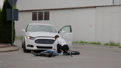 Following collision between car and electric scooter electric scooter accident Vidéo 272958257