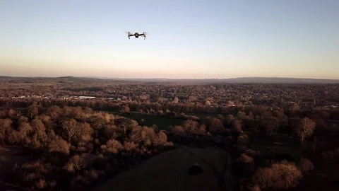Following Drone Over Countryside Stock Footage 103579672