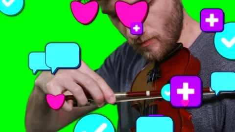 Following first bow stroke man in gray shirt bowing violin at green screen, Stock Footage 331833259