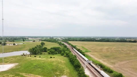 Following a freight train on the railroad. Stock-Footage 243597972