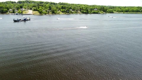 Following a jetski with a ferry in the background Stock Footage 158757327