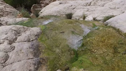 Following Mountain Spring to Small Waterfall Видео 77880398