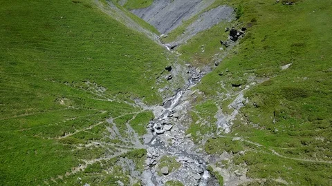 Following a river in the mountains Stock Footage 128715002
