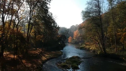 Following a River through the Forests in Vilnius, Lithuania (Drone footage) Stock Footage 114865763