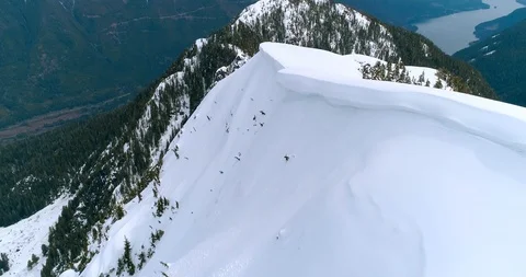Following A Snow Cornice Stock Footage 91380311