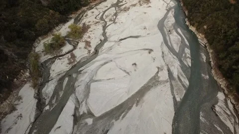 Following the Stream in the Dry Riverbed Stock Footage 241022362