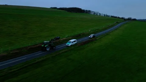 Following Tractor Cuckmere Cliffs 2 Stock Footage 296358021